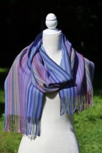 Hand woven alpaca scarf in blues.