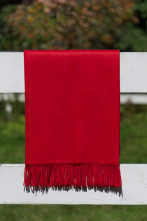 Alpaca blanket and sofa throw in scarlet red.