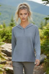 Women's Hi-Lo Hooded Pullover in Stonewash Blue, Made of 100% Pure Baby Alpaca. Our Go-To Layer for Performance Gear