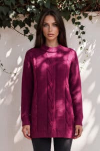 Baby alpaca cabled sweater in Bordeaux wine color with twisted cable pattern, garter‑stitch sleeves, relaxed silhouette, dropped shoulders, ribbed cuffs and hem