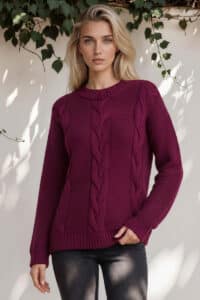 Baby alpaca cabled sweater in Bordeaux wine color with twisted cable pattern, garter‑stitch sleeves, relaxed silhouette, dropped shoulders, ribbed cuffs and hem
